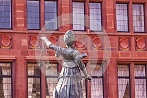 Statue of Lady Justice in front of the Romer in Frankfurt