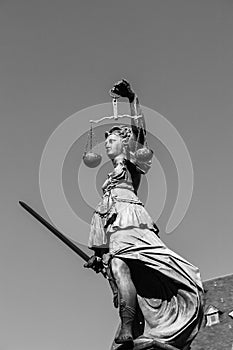 Statue of Lady Justice in front of the Romer in Frankfurt