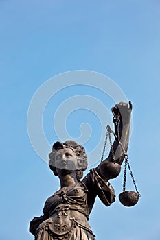 Statue of Lady Justice in front of the Romer in Frankfurt