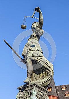 Statue of Lady Justice in front of the Romer in Frankfurt