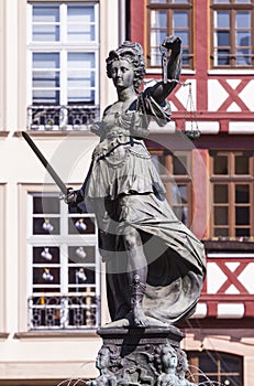 Statue of Lady Justice in front of the Romer in Frankfurt - Germany