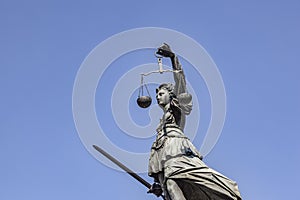 Statue of Lady Justice in front of the Romer in Frankfurt - Germany