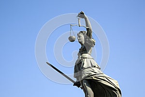 Statue of Lady Justice in front of the Romer in Frankfurt - Germany