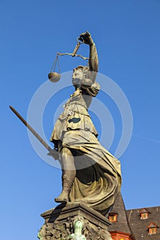 Statue of Lady Justice in front of the Romer in Frankfurt