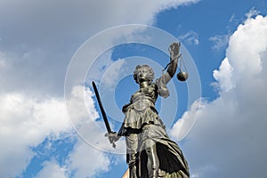 Statue of Lady Justice at the Roemer in Frankfurt photo