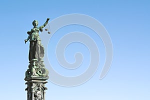 Statue of Lady Justice with scales