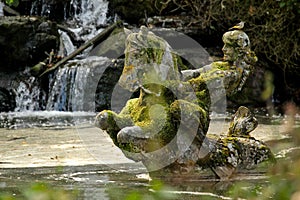 Statue in a lake photo