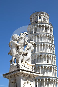 Statue And Leaning Tower Of Pisa