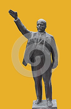 Statue of Lenin on the yellow background