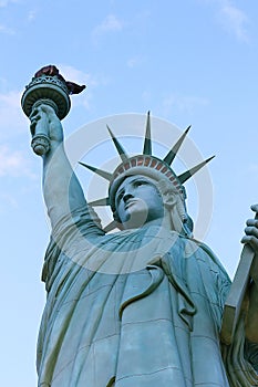 The Statue of Liberty is a colossal copper statue designed by Auguste Bartholdi a French sculptor was built by Gustave Eiffel  photo