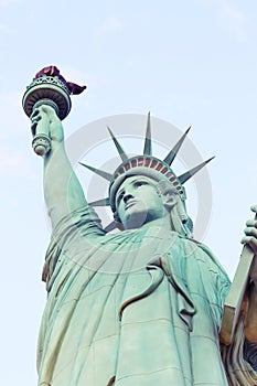 The Statue of Liberty is a colossal copper statue designed by Auguste Bartholdi a French sculptor was built by Gustave Eiffel  photo