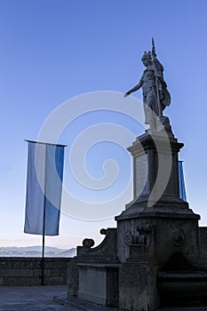 Statue of liberty avd Civil flag in San Marino republic, Italy.