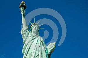 Statue of Liberty on blue clear sky, New York City, USA