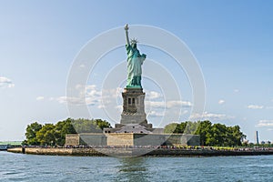 The statue of Liberty with blue sky background.