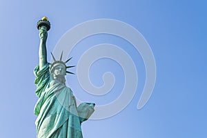 The statue of Liberty  with blue sky background
