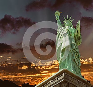 The Statue of Liberty blue sky orange yellow sunset of New York City