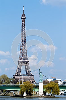 Statue of liberty and Eiffel tower in Paris