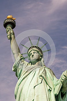 Statue of Liberty front view with torch and declaration of independence