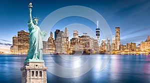 The Statue of Liberty with Lower Manhattan background in the evening, Landmarks of New York City