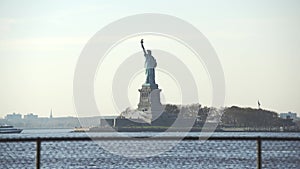 Statue of Liberty in Manhattan, NYC. Sunny day in New York