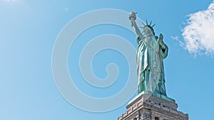 Statue of liberty monument with time lapse of cloud on summer sky in New York City, United states of America