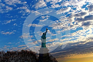 Statue of Liberty New York City back view at dusk or dawn