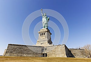 Statue of Liberty in New York City in cloudless day, USA.