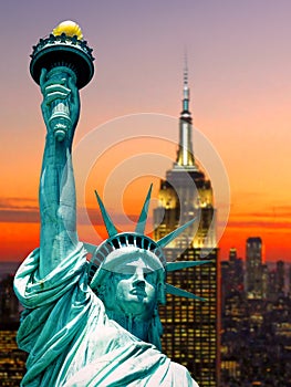 Statue of liberty new york city usa sunset dusk skyscrapers