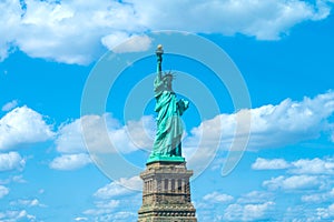 Statue of Liberty, New York, USA over blue sky