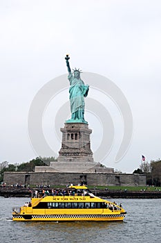 Statue of Liberty and a New York Yellow Water Taxi