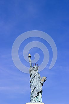 Statue of Liberty in Paris with a clear blue sky