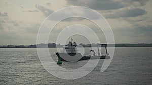 Statue of liberty and sailing boat at the sunset