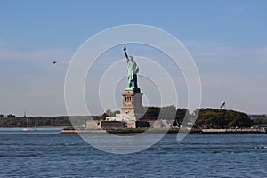 The Statue of Liberty stands proudly at the entrance to Manhattan