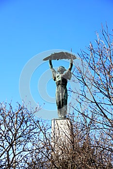 Liberty statue on top of Gellert Mountain, Budapest, Hungary. photo