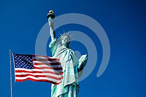 Statue of Liberty and United States flag in New York City