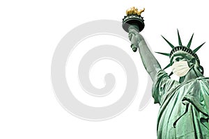 Statue of Liberty wearing a surgical mask isolated on white background. New coronavirus, covid-19 in New York and USA epidemic c