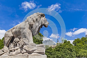 Statue Lion a l`enfant at Pont Alexandre III in Paris photo