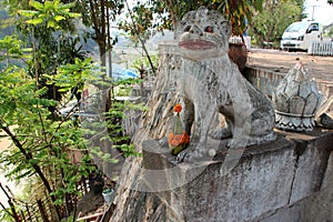 statue of a lion in luang prabang (laos)
