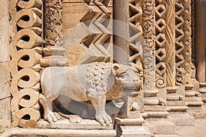 Statue of lion on the portal of Jak chapel, Budapest, Hungary