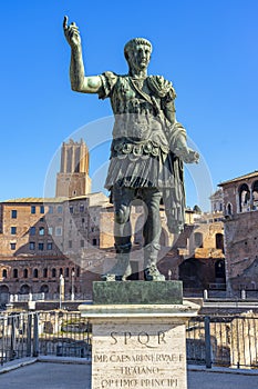 statue located next to the palatine hill in representation of SPQR emperor caesari nervae f traiano optimo principi photo