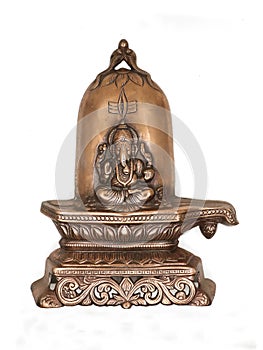 statue of lord ganesh sitting on a sacred shiva linga stone