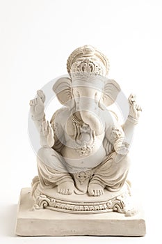 Statue of Lord Ganesha Made from plaster of Paris without color on white background