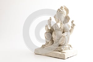 Statue of Lord Ganesha Made from plaster of Paris without color on white background