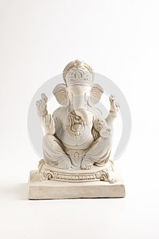 Statue of Lord Ganesha Made from plaster of Paris without color on white background