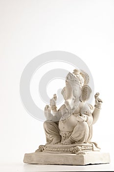 Statue of Lord Ganesha Made from plaster of Paris without color on white background