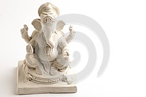 Statue of Lord Ganesha Made from plaster of Paris without color on white background