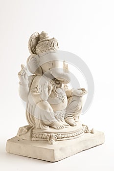 Statue of Lord Ganesha Made from plaster of Paris without color on white background