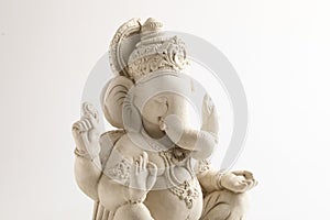 Statue of Lord Ganesha Made from plaster of Paris without color on white background