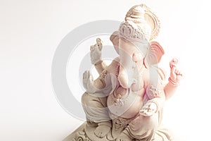 Statue of Lord Ganesha Made from plaster of Paris without color on white background