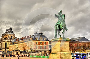 Statue of Louis XIV in front of the Palace of Versailles